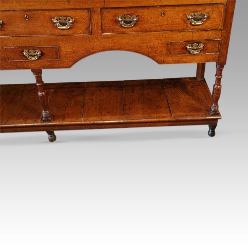 fig 4. Antique long oak pot board dresser