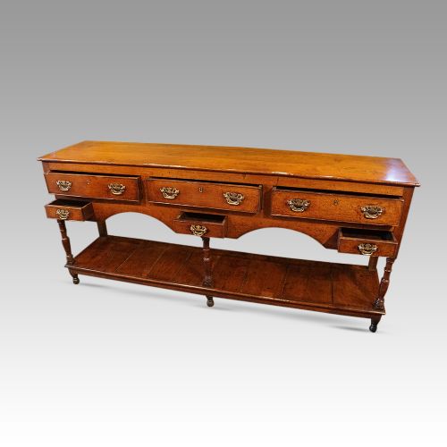 fig 5. Antique long oak pot board dresser