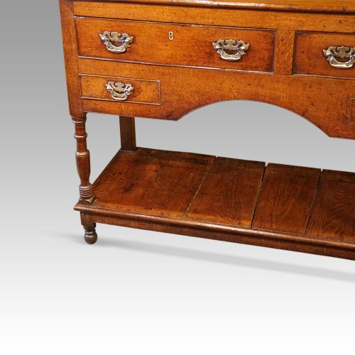 fig 6. Antique long oak pot board dresser