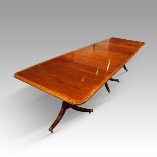 fig 1. George V mahogany triple pillar dining table