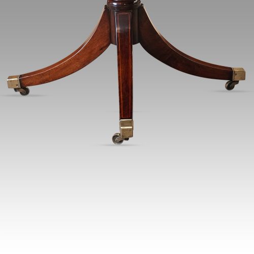 fig 3. George V mahogany triple pillar dining table