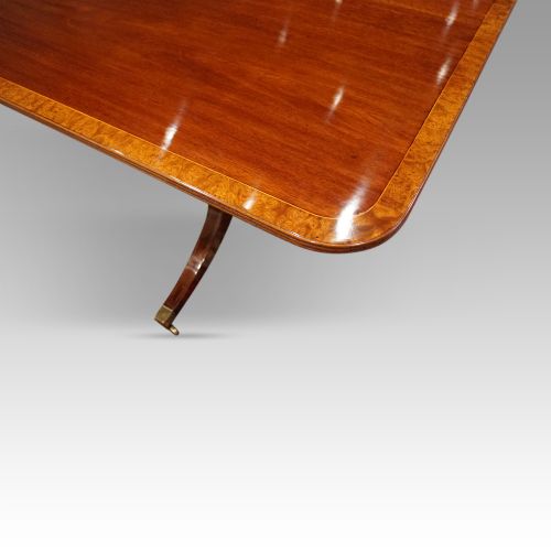 fig 5. George V mahogany triple pillar dining table
