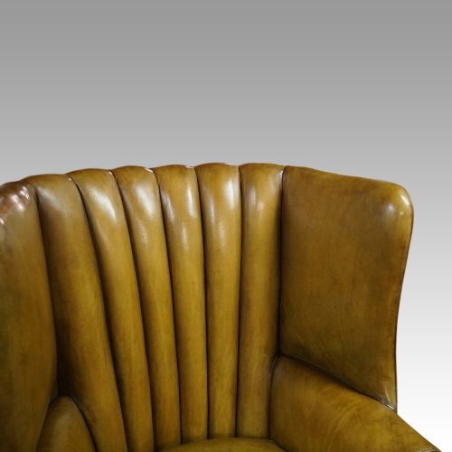 fig 2. Antique leather wing chair