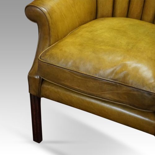 fig 3. Antique leather wing chair