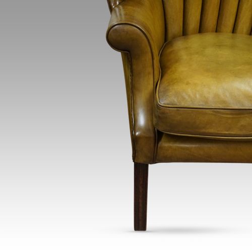 fig 5. Antique leather wing chair