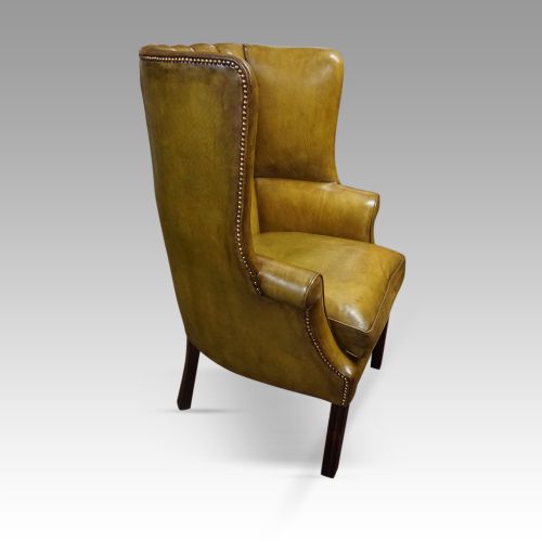 fig 8. Antique leather wing chair