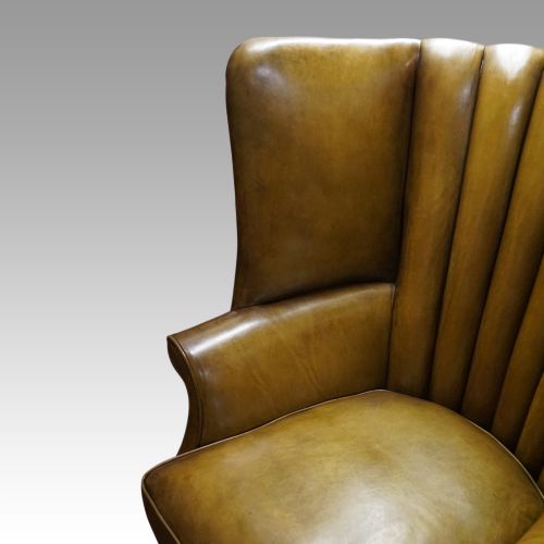 fig 9. Antique leather wing chair