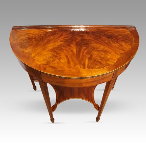 fig 8. Pair of Edwardian demi-lune tables