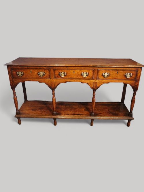 fig 4. Antique oak dresser with pot board