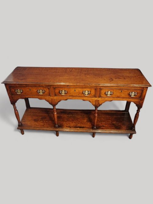 fig 6. Antique oak dresser with pot board
