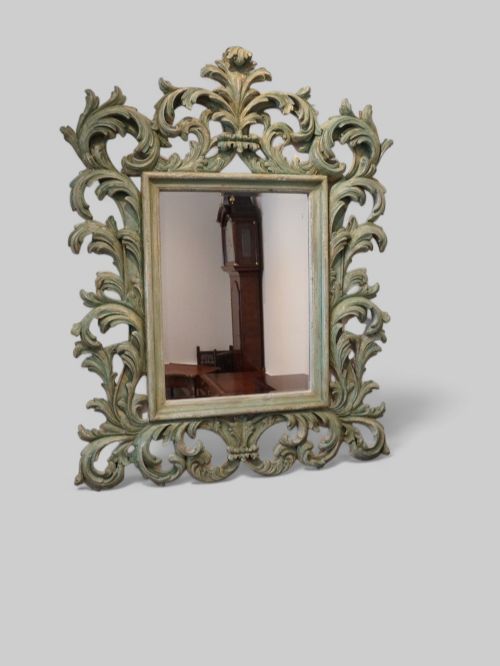 fig 7. Large carved teak Florentine mirror