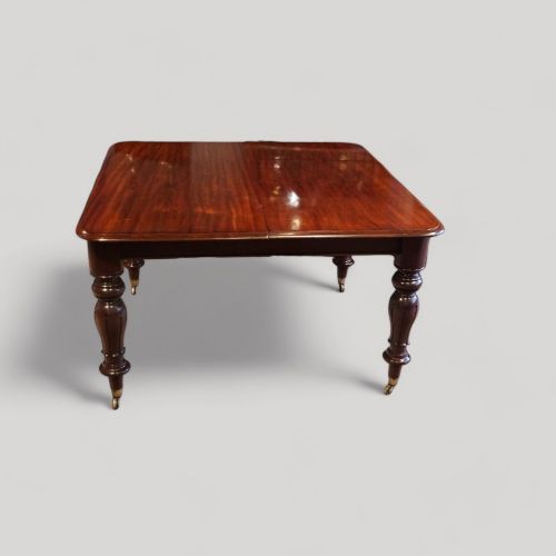 fig 1. Antique mahogany extending dining table 14 seat