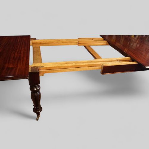 fig 2. Antique mahogany extending dining table 14 seat