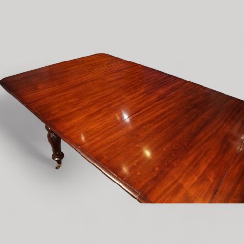 fig 4. Antique mahogany extending dining table 14 seat