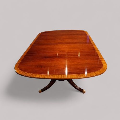 fig 1. Sheraton style mahogany twin pillar dining table
