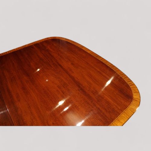 fig 5. Sheraton style mahogany twin pillar dining table