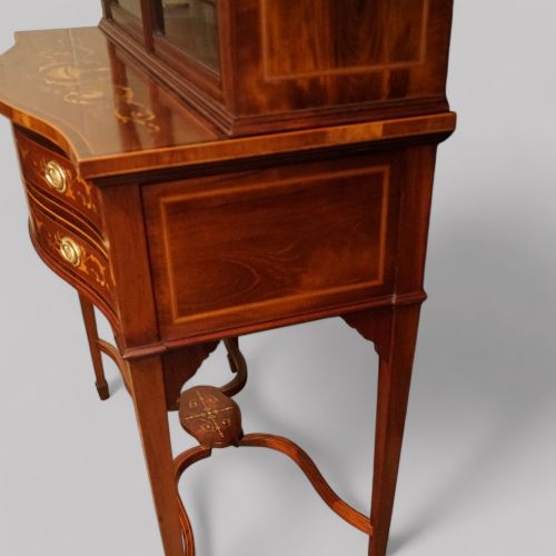 fig 1. Edwardian inlaid serpentine display cabinet