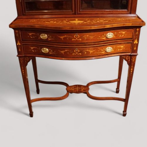 fig 2. Edwardian inlaid serpentine display cabinet