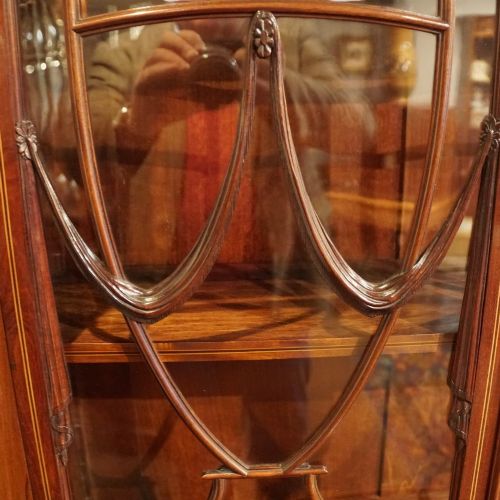 fig 4. Edwardian inlaid serpentine display cabinet