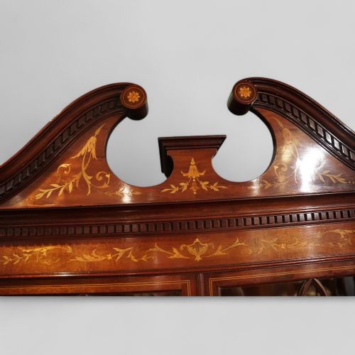 fig 7. Edwardian inlaid serpentine display cabinet