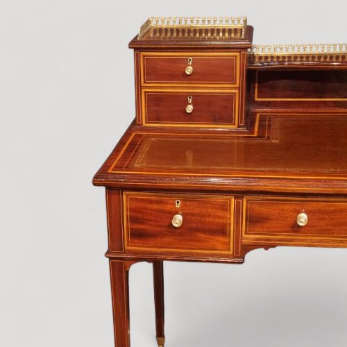 fig 6. Edwardian inlaid mahogany writing table