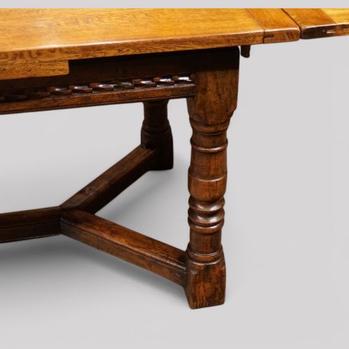 fig 6. Oak refectory draw leaf dining table