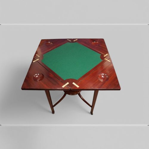 fig 4. Edwardian mahogany envelope card table