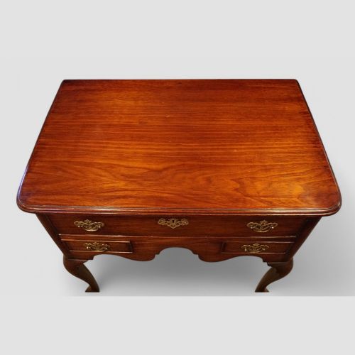 fig 6. George II red walnut lowboy
