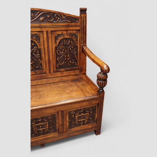 fig 1. Edwardian golden oak carved settle