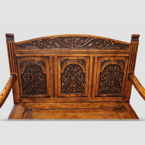 fig 3. Edwardian golden oak carved settle