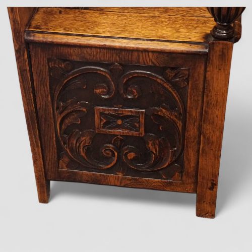 fig 4. Edwardian golden oak carved settle