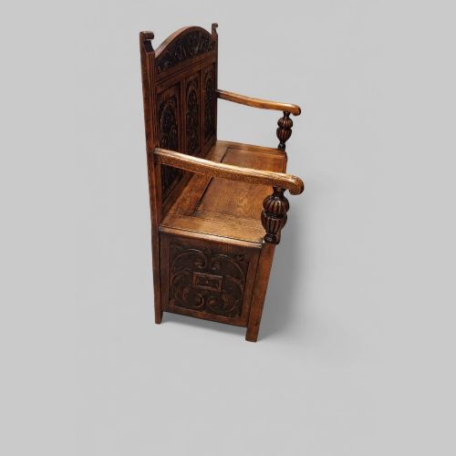 fig 5. Edwardian golden oak carved settle