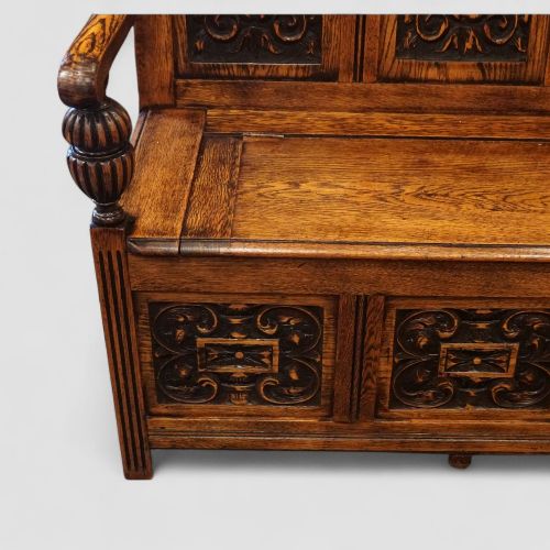 fig 8. Edwardian golden oak carved settle