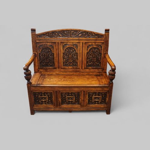 fig 9. Edwardian golden oak carved settle