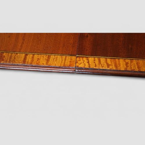 fig 3. George V mahogany twin pillar dining table