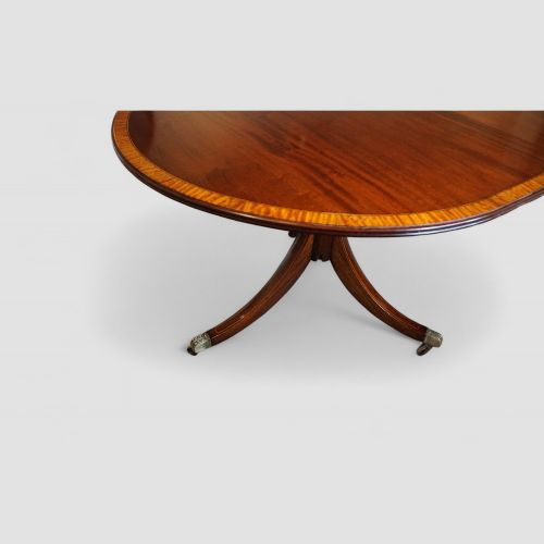 fig 5. George V mahogany twin pillar dining table