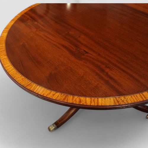 fig 6. George V mahogany twin pillar dining table