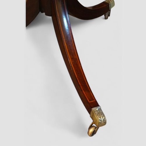 fig 7. George V mahogany twin pillar dining table