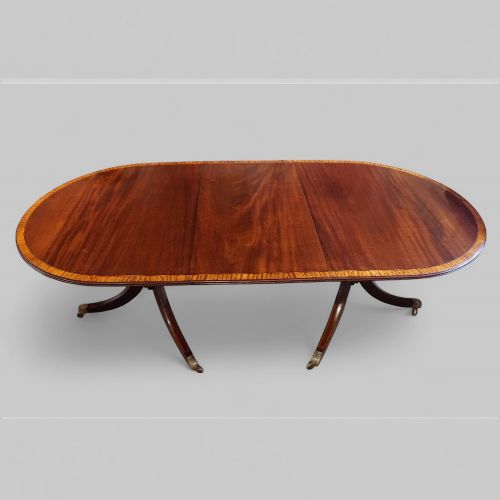 fig 8. George V mahogany twin pillar dining table