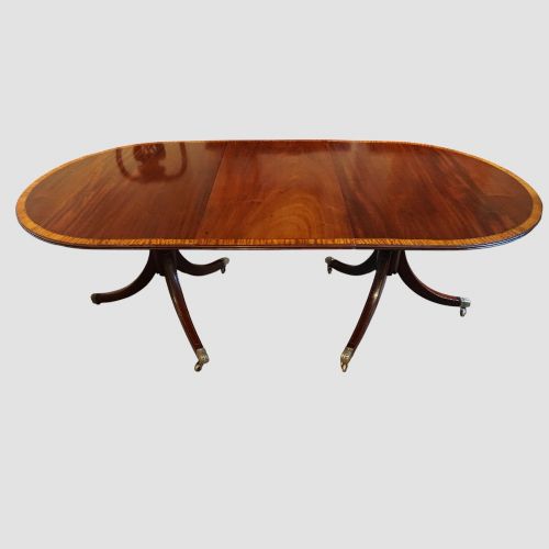 fig 11. George V mahogany twin pillar dining table