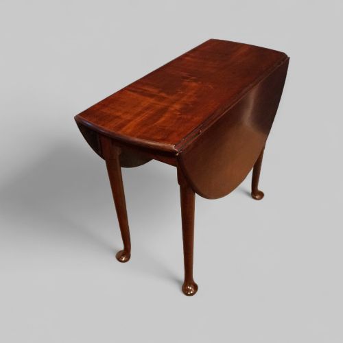 fig 4. Small George II mahogany padfoot table