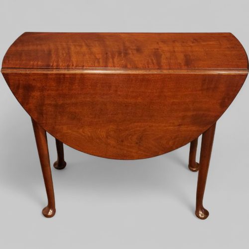 fig 5. Small George II mahogany padfoot table