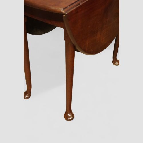 fig 6. Small George II mahogany padfoot table