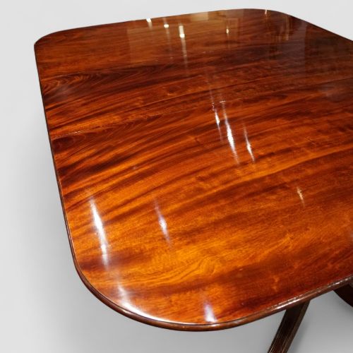 fig 5. Georgian-style mahogany twin-pillar dining table