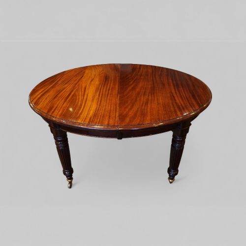 fig 5. Victorian Mahogany Extending Dining Table with Two Leaves and Fluted Legs