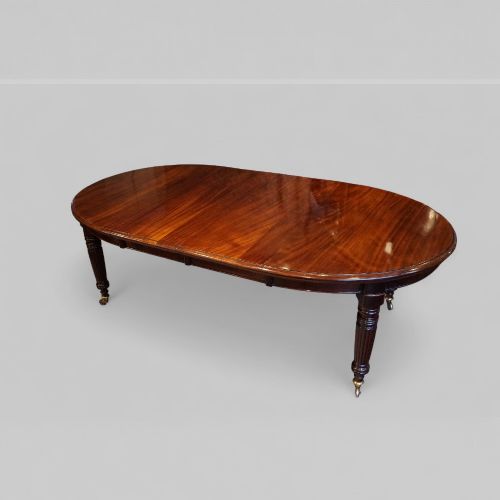 fig 7. Victorian Mahogany Extending Dining Table with Two Leaves and Fluted Legs