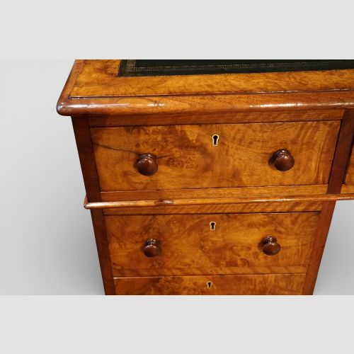 fig 3. Victorian burr walnut pedestal desk