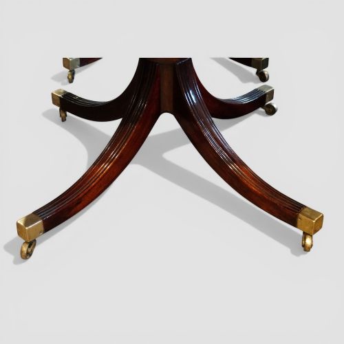 fig 7. George V mahogany 3-pillar dining table