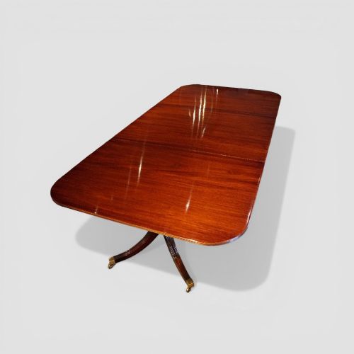 fig 10. George V mahogany 3-pillar dining table