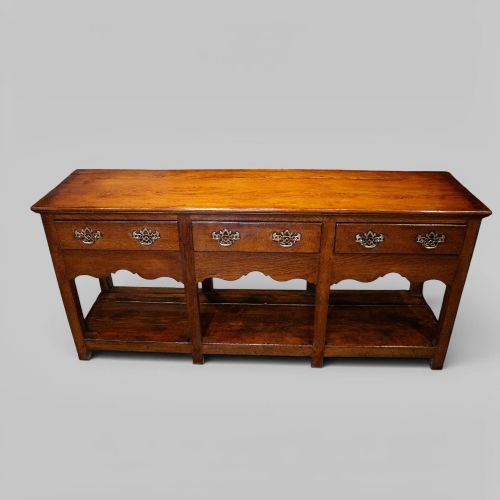 19TH CENTURY OAK DRESSER BASE WITH POT BOARD AND THREE DRAWERS